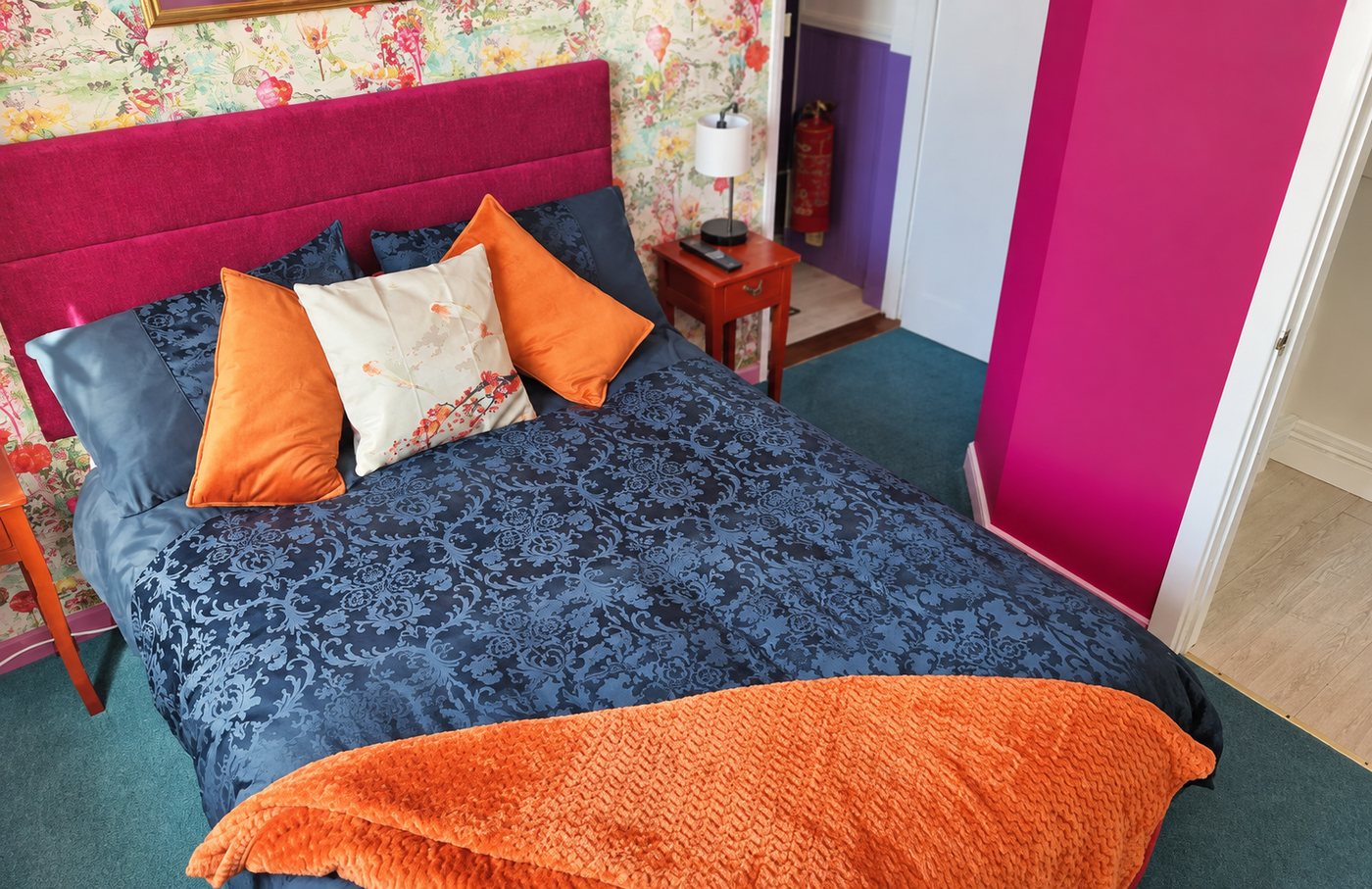 Family room with colourful walls at Philbeach Guest House
